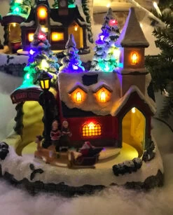 Battery Operated Lighted Musical Animated Winter Holiday Snow Village - Santa And Reindeer 5 Battery Operated Lighted Musical Animated Winter Holiday Snow Village - Santa And Reindeer -Home Candle Shop 2355220 santa reindeer