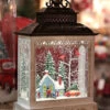 11 Inch Cabin With Red Wagon In The Woods Lighted Water Lantern - Optional Music Setting -Home Candle Shop 2497520 blue house